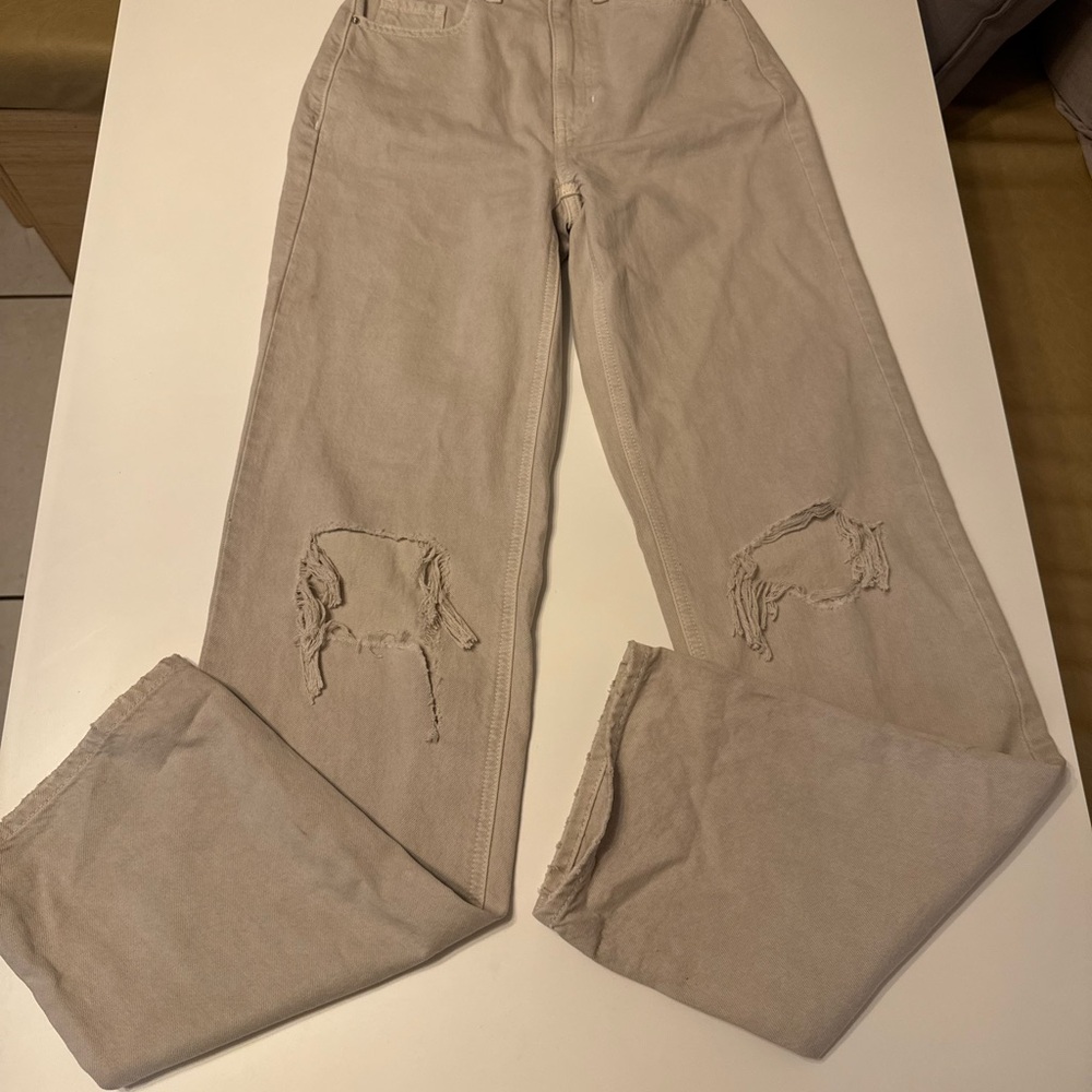 PacSun beige distressed denim jeans with ripped knees